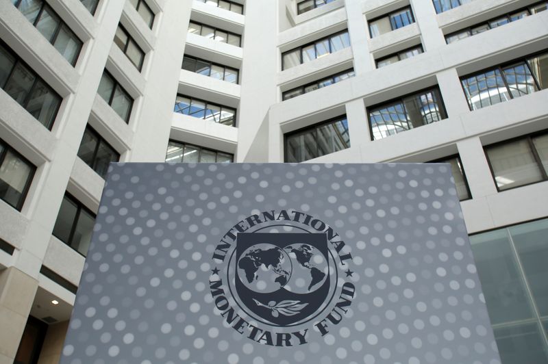 &copy; Reuters. LE FMI RÉDUIT ENCORE SES PRÉVISIONS POUR L&apos;ÉCONOMIE MONDIALE