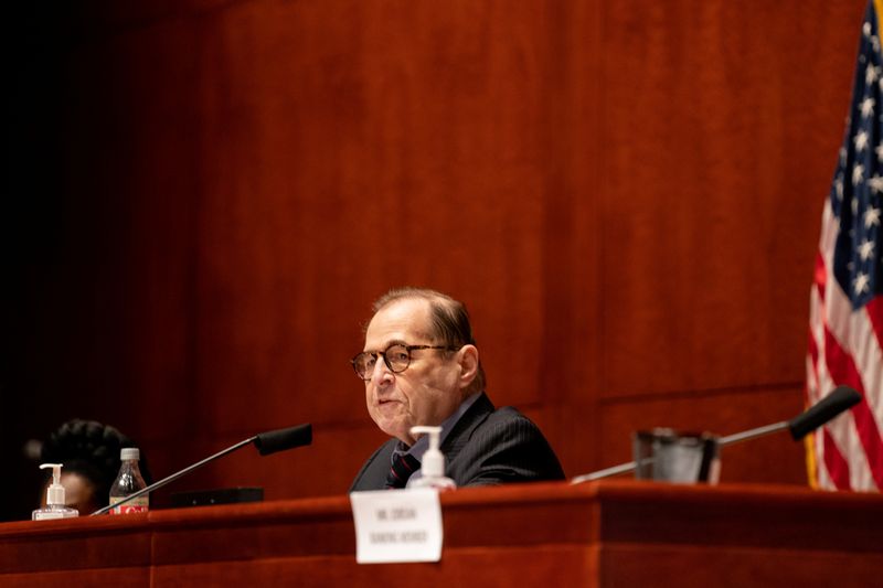 © Reuters. U.S. Justice Department employees testify before the U.S.House Judiciary Committee, in Washington