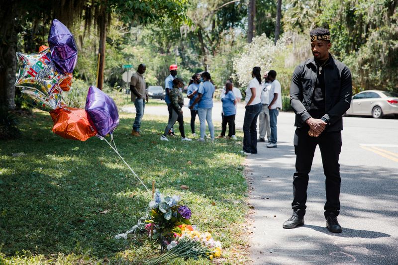 &copy; Reuters. FILE PHOTO: Supporters of the Georgia NAACP protest shooting death in Brunswick