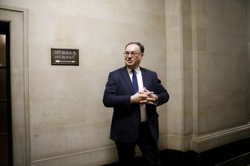 &copy; Reuters. FILE PHOTO: Bank of England Governor Andrew Bailey poses for a photograph on the first day of his new role at the Central Bank in London