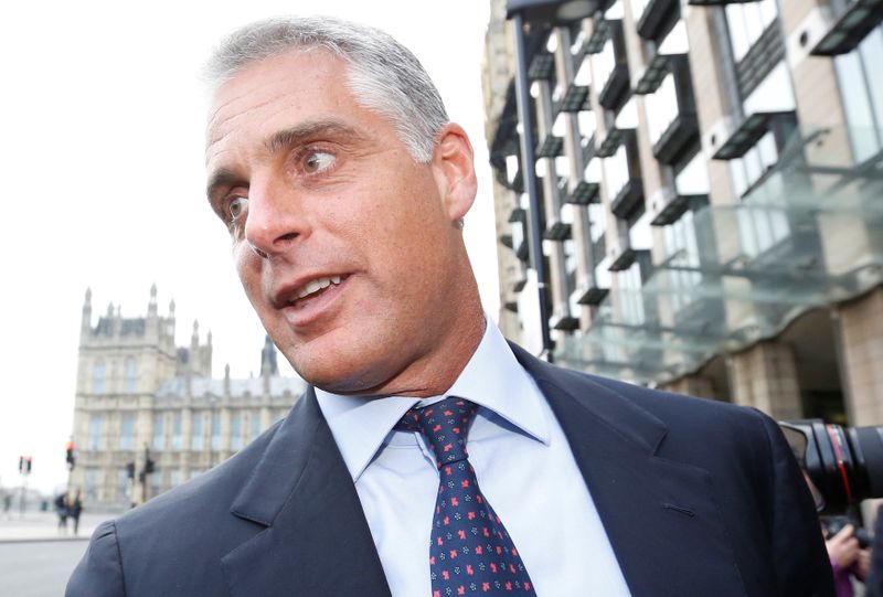 &copy; Reuters. FILE PHOTO: UBS chief executive Andrea Orcel leaves after attending a UK parliamentary inquiry into Libor interest rates in London