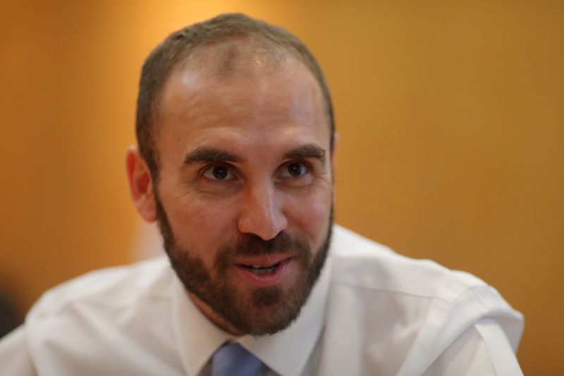 &copy; Reuters. FILE PHOTO: Argentine Economy Minister Martin Guzman reacts during an interview with Reuters, in Buenos Aires