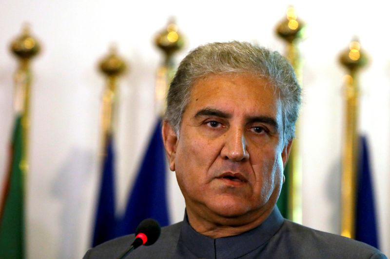 &copy; Reuters. Pakistan&apos;s new Foreign Minister Shah Mehmood Qureshi listens during a news conference at the Foreign Ministry in Islamabad