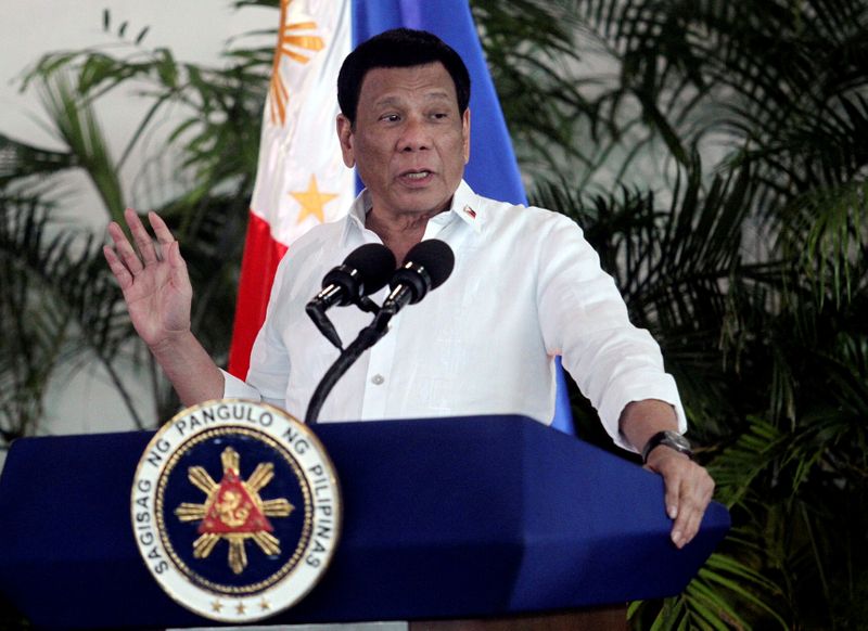 &copy; Reuters. FILE PHOTO: President Rodrigo Duterte speaks after his arrival in Davao
