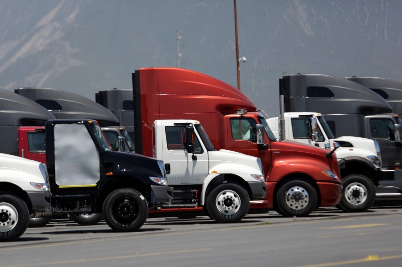 &copy; Reuters. Trucks are parked at a yard of the manufacturing plant of International brand commercial trucks, owned by Navistar, in Escobedo