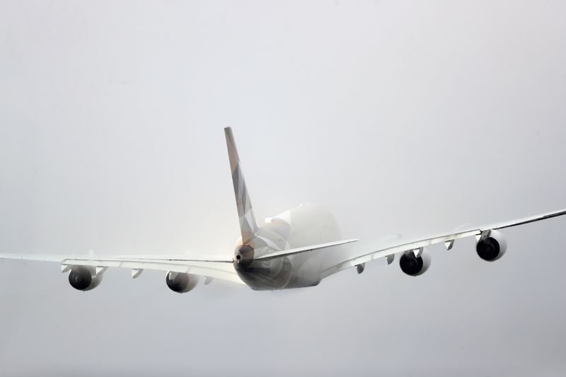 &copy; Reuters. FILE PHOTO: Etihad aircraft disappears into the clouds as it takes off from Heathrow Airport in London