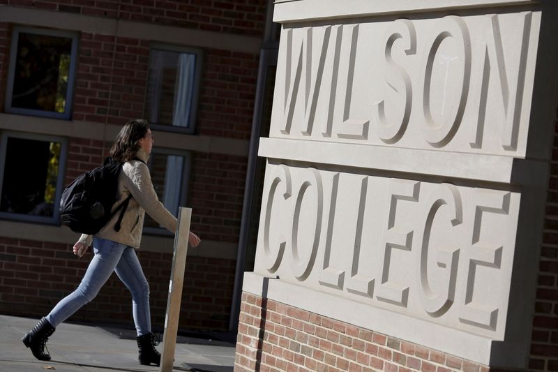 &copy; Reuters. A student walks towards Princeton University&apos;s Wilson College in Princeton