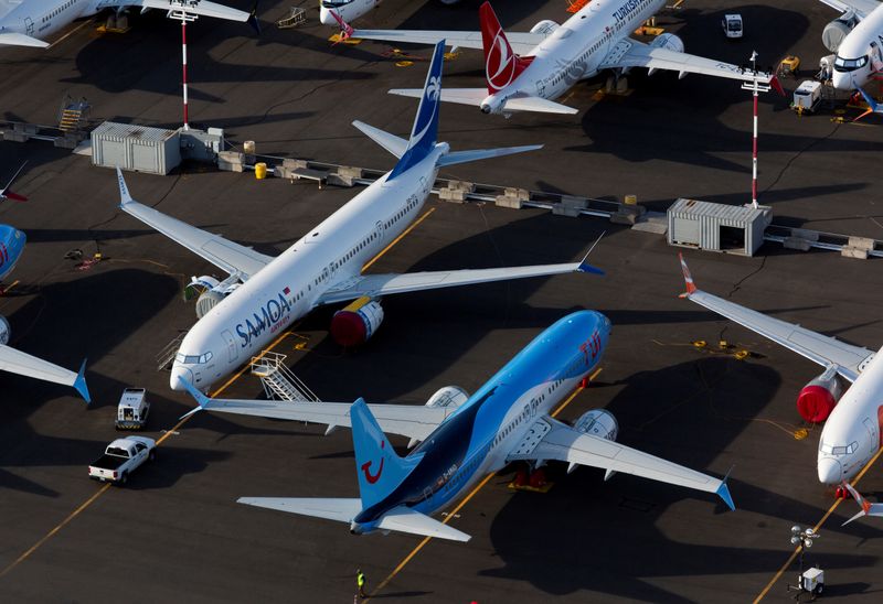 &copy; Reuters. FILE PHOTO: Boeing 737 Max aircraft are parked in a parking lot at Boeing Field in this aerial photo over Seattle