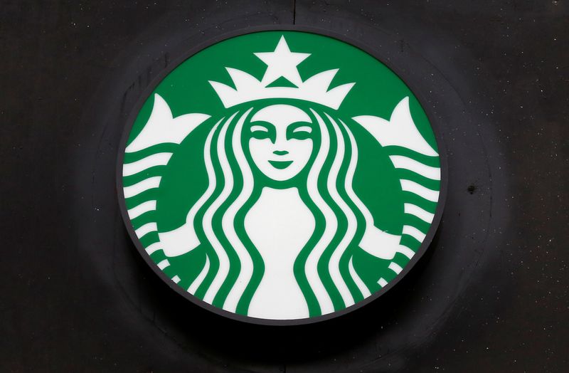 &copy; Reuters. A Starbucks store sign is shown during the coronavirus disease (COVID-19) outbreak in Valparaiso