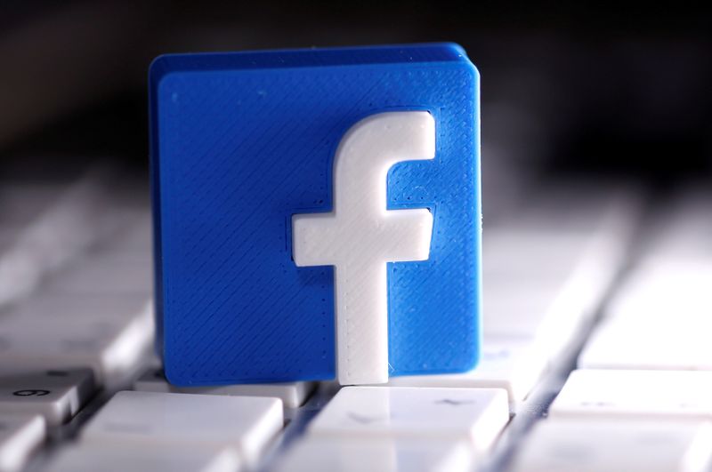 &copy; Reuters. A 3D-printed Facebook logo is seen placed on a keyboard in this illustration