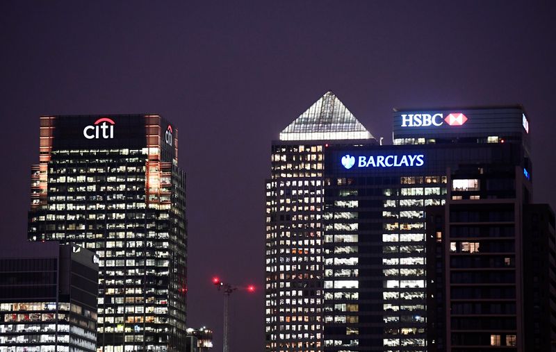 &copy; Reuters. Office blocks of Citi, Barclays, and HSBC banks are seen at dusk in the Canary Wharf financial district in London,