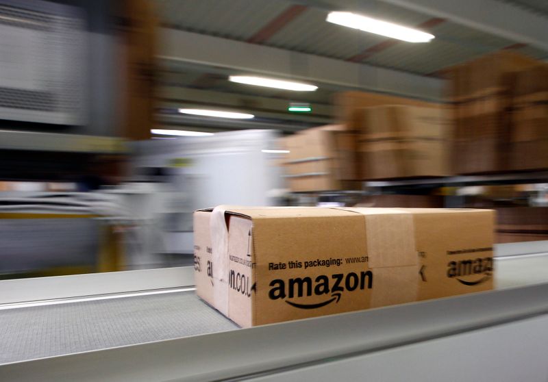 &copy; Reuters. A parcel moves on the conveyor belt at Amazon&apos;s logistics centre in Graben
