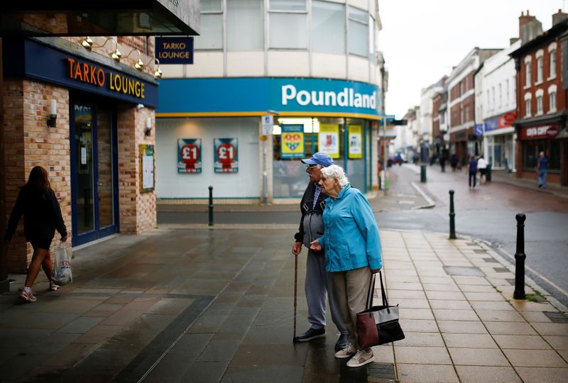 &copy; Reuters. People walk down the High Street in Barnstaple