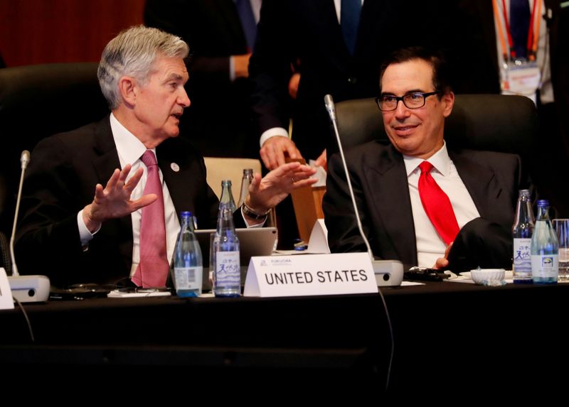 &copy; Reuters. FILE PHOTO: Federal Reserve Chairman Jerome Powell talks with U.S. Treasury Secretary Steven Mnuchin during the G20 finance ministers and central bank governors meeting in Fukuoka