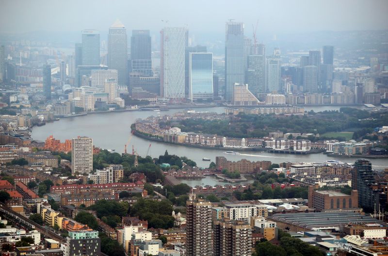 &copy; Reuters. FILE PHOTO: The Canary Wharf financial district is seen from the construction site of 22 Bishopsgate in London