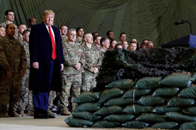 &copy; Reuters. FILE PHOTO: U.S. President Donald Trump makes an unannounced visit to U.S. troops at Bagram Air Base in Afghanistan