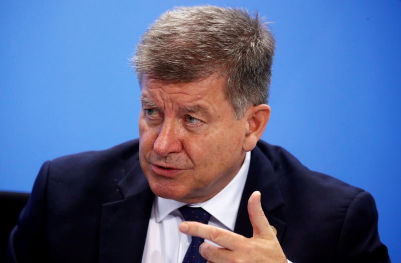 © Reuters. FILE PHOTO: ILO Director-General Ryder attends news conference after meeting at Chancellery in Berlin