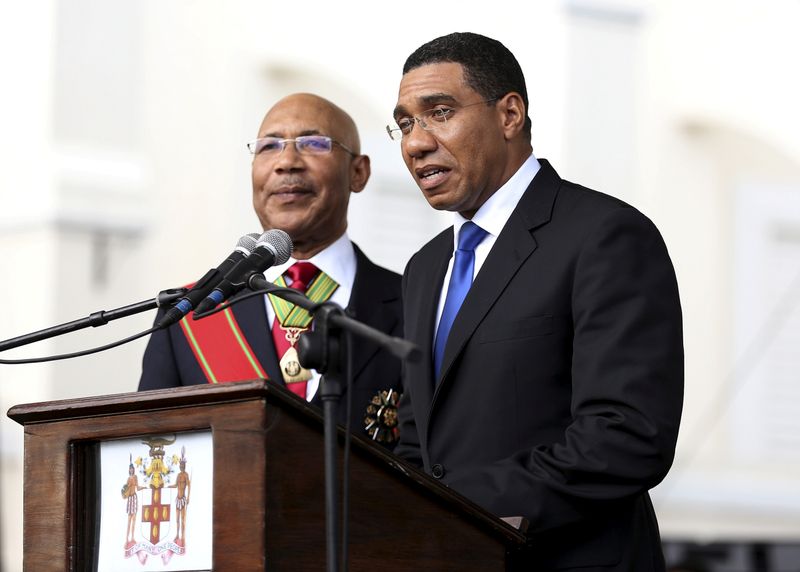 &copy; Reuters. FILE PHOTO: Jamaica&apos;s Prime Minister Andrew Holness addresses the audience next to Jamaica&apos;s Governor-General Sir Patrick Allen during his swearing-in ceremony in Kingston