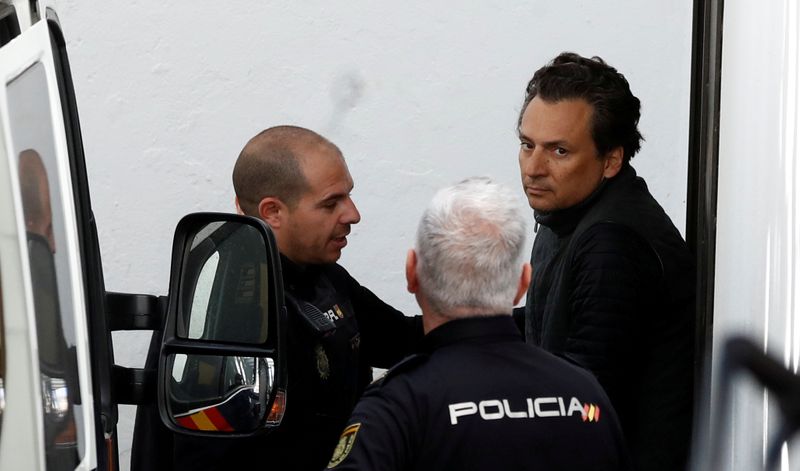 &copy; Reuters. FILE PHOTO: Former chief executive of Mexico&apos;s state oil firm Pemex, Emilio Lozoya, is escorted by Spanish police officers as he leaves a court after appeared in Spain&apos;s High Court via video conference, after his detention in southern Spain on W