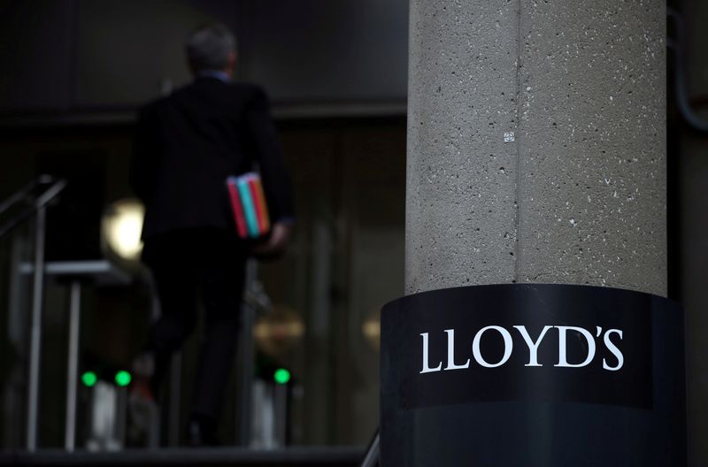 &copy; Reuters. FILE PHOTO: Man enters the Lloyd&apos;s of London building in the City of London financial district