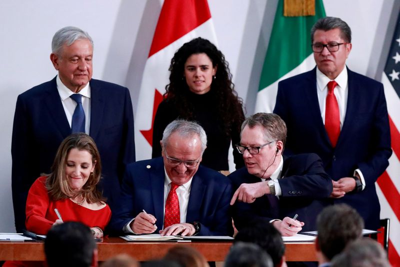 &copy; Reuters. FILE PHOTO: U.S.-Mexico-Canada Agreement (USMCA) signing in Mexico City