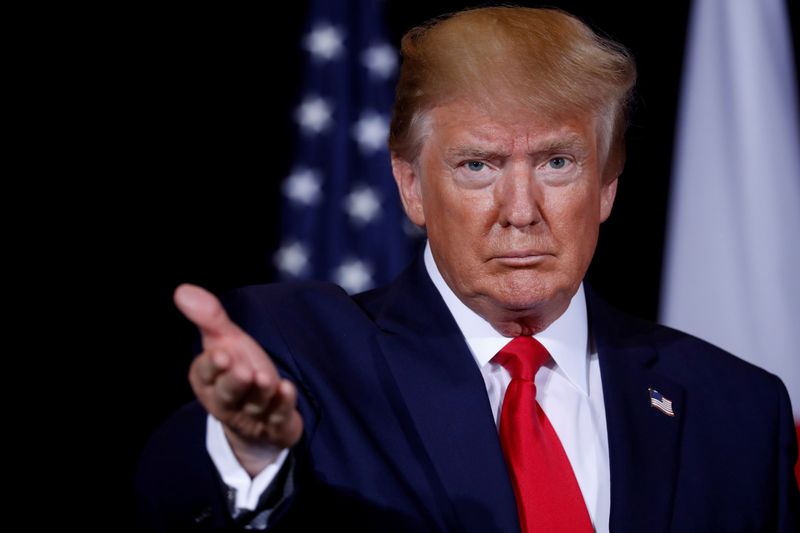 &copy; Reuters. FILE PHOTO: U.S. President Trump gestures towards reporters during meeting with Japan&apos;s Prime Minister Abe meets in New York City, New York