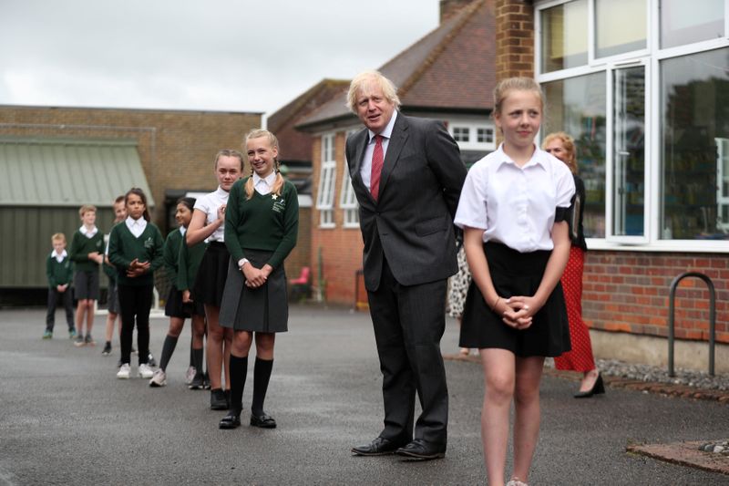 © Reuters. FILE PHOTO: British PM Johnson visits Bovingdon Primary School in Hertfordshire