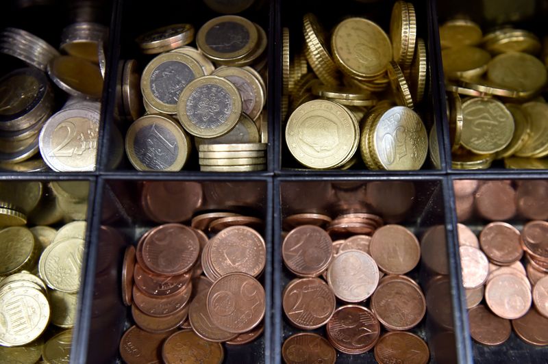 &copy; Reuters. FILE PHOTO: Euro coins are displayed in a shop in Brussels