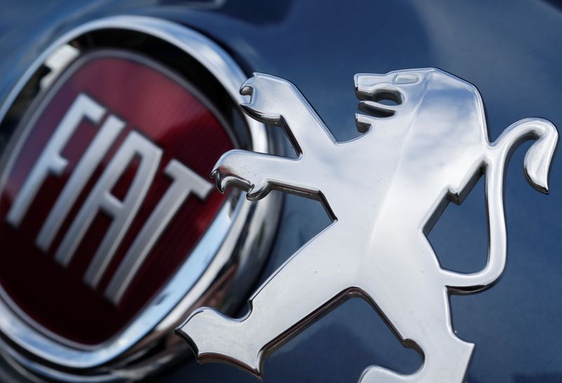 &copy; Reuters. Logos of Peugeot and Fiat are seen in this illustration picture
