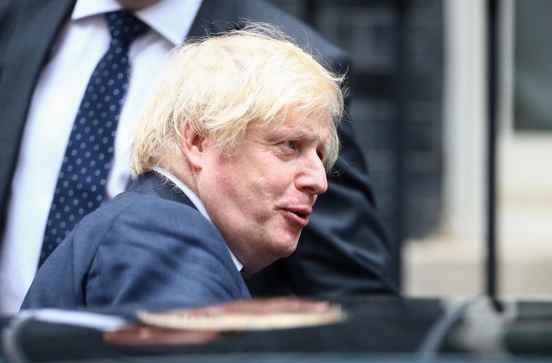&copy; Reuters. FILE PHOTO:  Britain&apos;s Prime Minister Boris Johnson leaves Downing Street in London