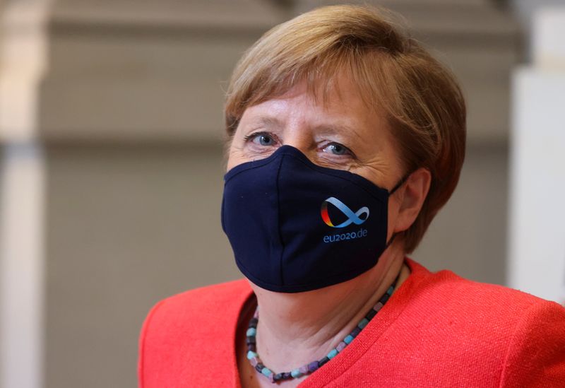 &copy; Reuters. German Chancellor Angela Merkel wearing a face mask is seen after a session at the upper house of the German parliament Bundesrat, following the outbreak of the coronavirus disease (COVID-19), in Berlin