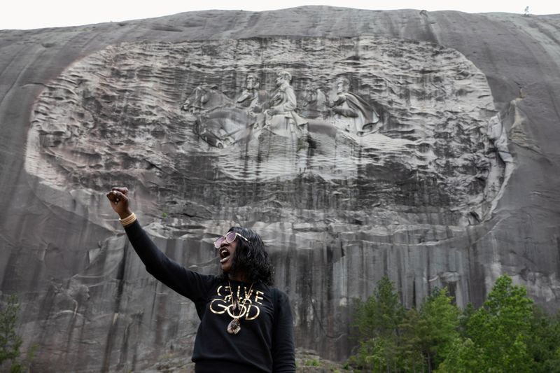 &copy; Reuters. FILE PHOTO: Protesters rally against racial inequality in Stone Mountain