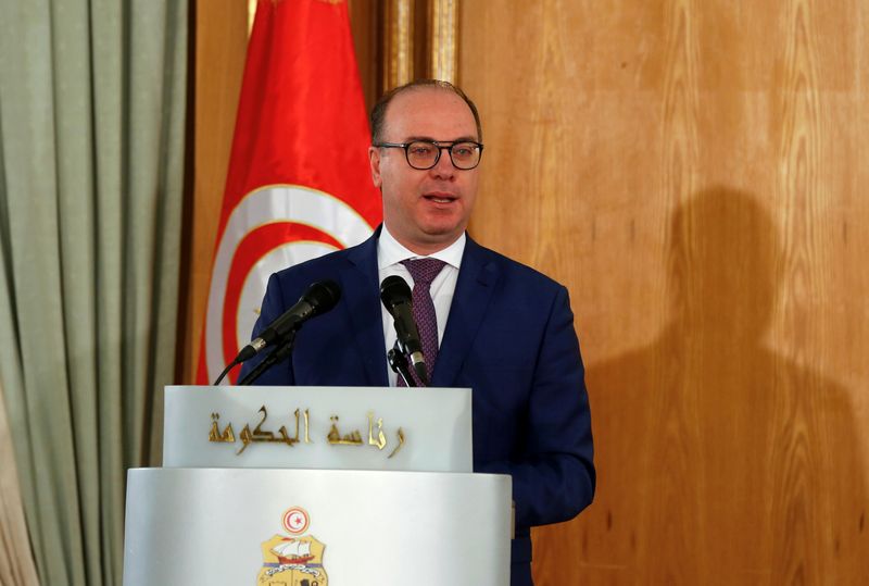 &copy; Reuters. FILE PHOTO: Tunisia&apos;s Prime Minister Elyes Fakhfakh speaks during a handover ceremony in Tunis