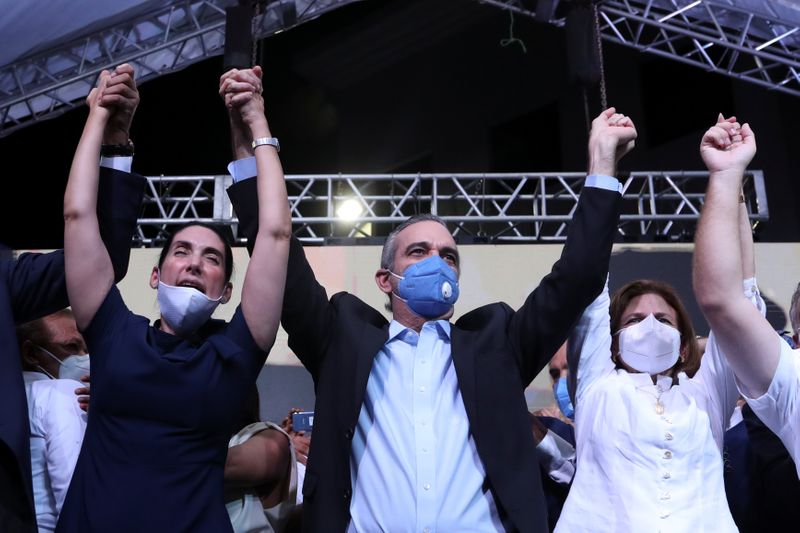 &copy; Reuters. Presidential candidate Luis Abinader, of the opposition Modern Revolutionary Party (PRM), celebrates in Santiago