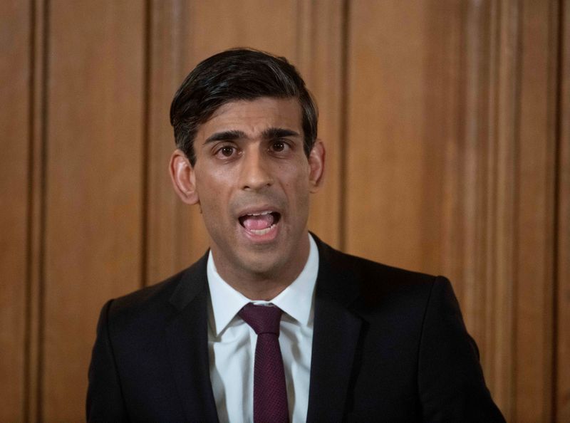 &copy; Reuters. FILE PHOTO: British PM Johnson holds a news conference with Chancellor of the Exchequer Rishi Sunak and Deputy Chief Medical Officer Dr Jenny Harries on coronavirus in London