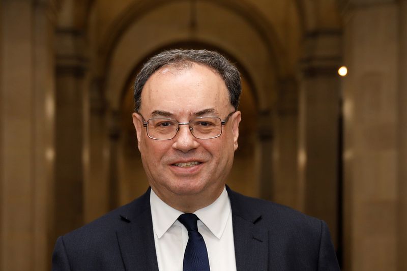 &copy; Reuters. FILE PHOTO: Bank of England Governor Andrew Bailey poses for a photograph on the first day of his new role at the Central Bank in London