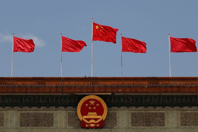 &copy; Reuters. Chinese flag flutters at the Great Hall of the People in Beijing
