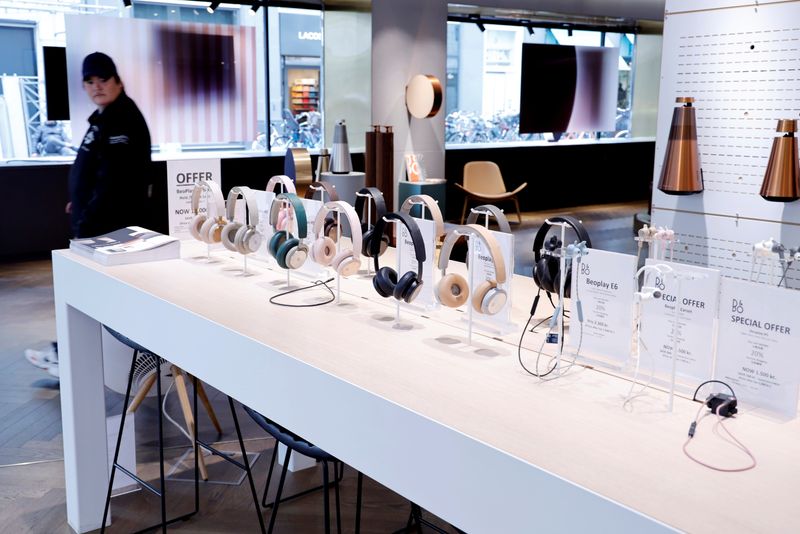 &copy; Reuters. A man walks past displayed headphones in the Bang &amp; Olufsen flagship store in Copenhagen