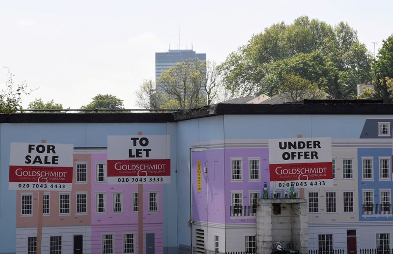 &copy; Reuters. FILE PHOTO: An estate agent property advertisment is seen painted on a wall in London