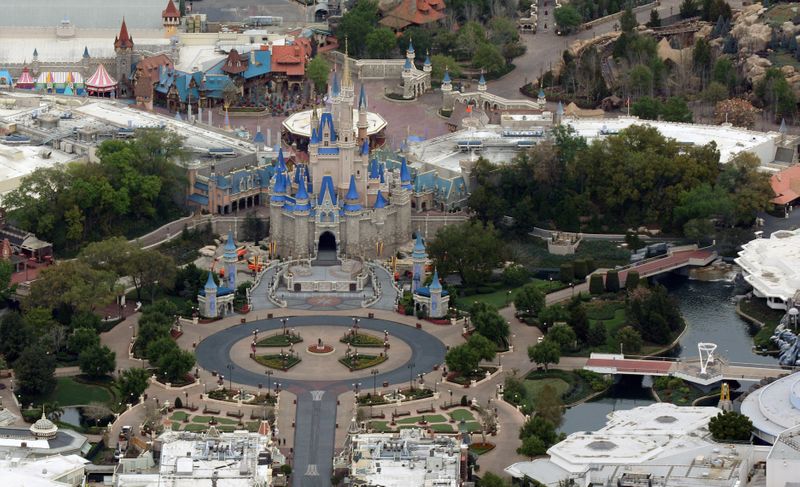 © Reuters. Disney's Magic Kingdom theme park sits empty after it closed in an effort to combat the spread of coronavirus disease (COVID-19) in Orlando