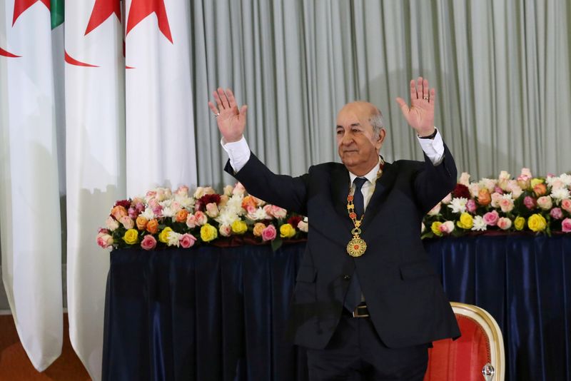 © Reuters. FILE PHOTO: Newly elected Algerian President Abdelmadjid Tebboune gestures during a swearing-in ceremony in Algiers