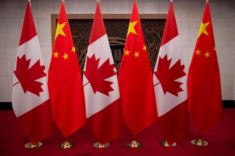 &copy; Reuters. FILE PHOTO: Picture of Canadian and Chinese flags taken prior to the meeting with Canada&apos;s Prime Minister Justin Trudeau and China&apos;s President Xi Jinping at the Diaoyutai State Guesthouse in Beijing