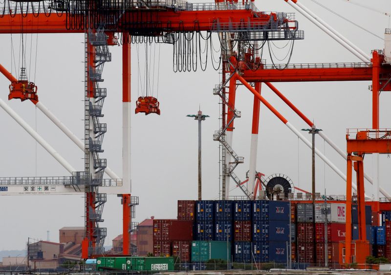 &copy; Reuters. FILE PHOTO: Containers are seen at an industrial port in the Keihin Industrial Zone in Kawasaki