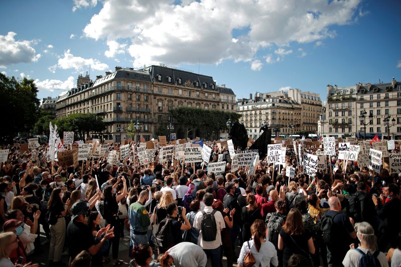 © Reuters. Feminist activists demonstrate against new government appointments in Paris