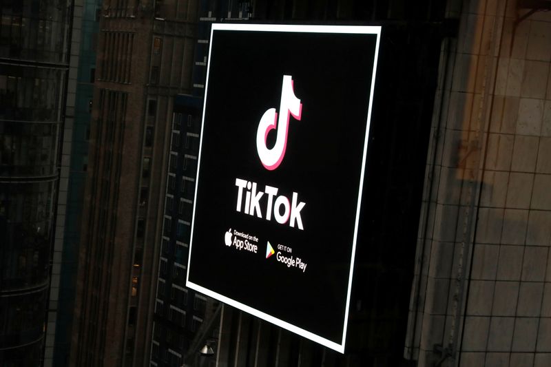 &copy; Reuters. The TikTok logo is seen on a screen over Times Square in New York City