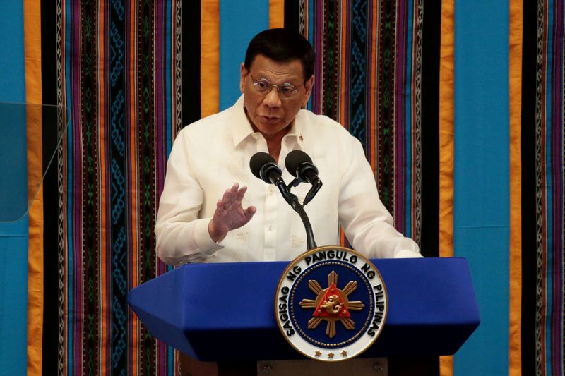 &copy; Reuters. FILE PHOTO: Philippine President Rodrigo Duterte gestures during his fourth State of the Nation Address at the Philippine Congress in Quezon City