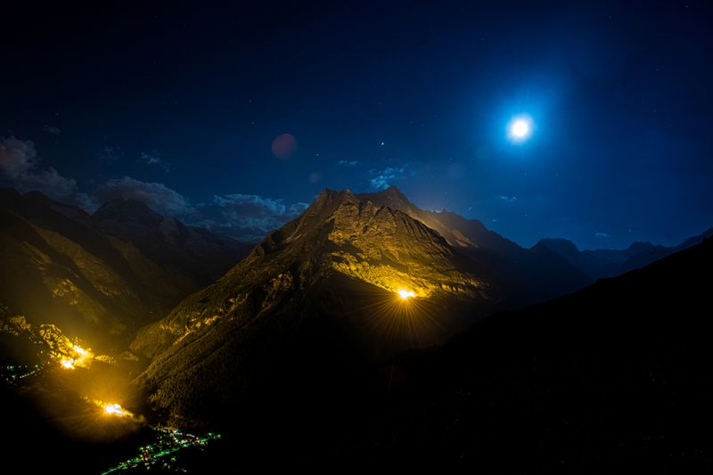 &copy; Reuters. The mountain chains of Veisivi and Dent de Perroc are illuminated to celebrate Swiss National Day in Evolene