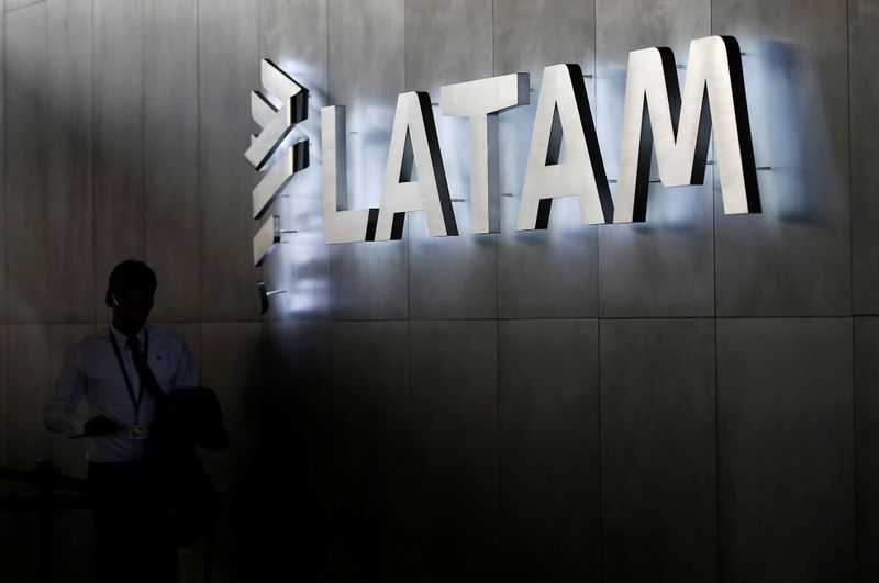 &copy; Reuters. LATAM airlines logo, is seen inside of the Commodore Arturo Merino Benitez International Airport in Santiago