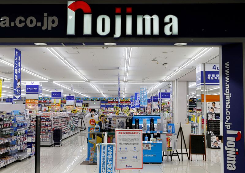 © Reuters. The logo of Nojima is displayed at the entrance of their store in Fujisawa