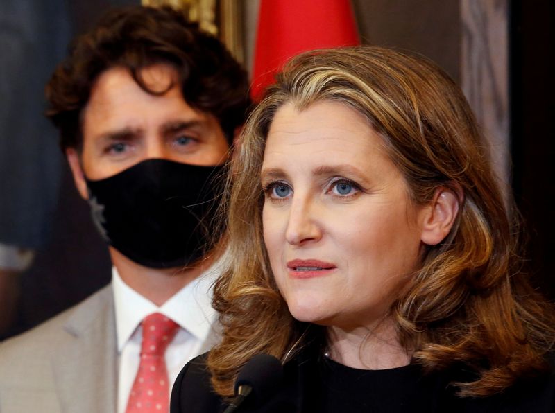 &copy; Reuters. FILE PHOTO: Deputy Prime Minister and Finance Minister  Freeland speaks to reporters next to Canadian Prime Minister Trudeau on Parliament Hill in Ottawa